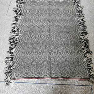 Handmade Taznakht Moroccan rug in natural black and ivory wool 110x150 cm